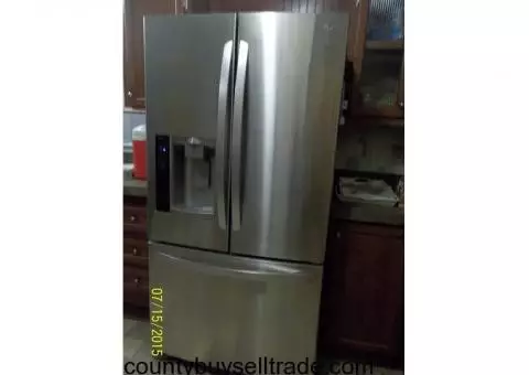 Moving and must sell Stainless Steel LG Refrigerator/Freezer 7 months old